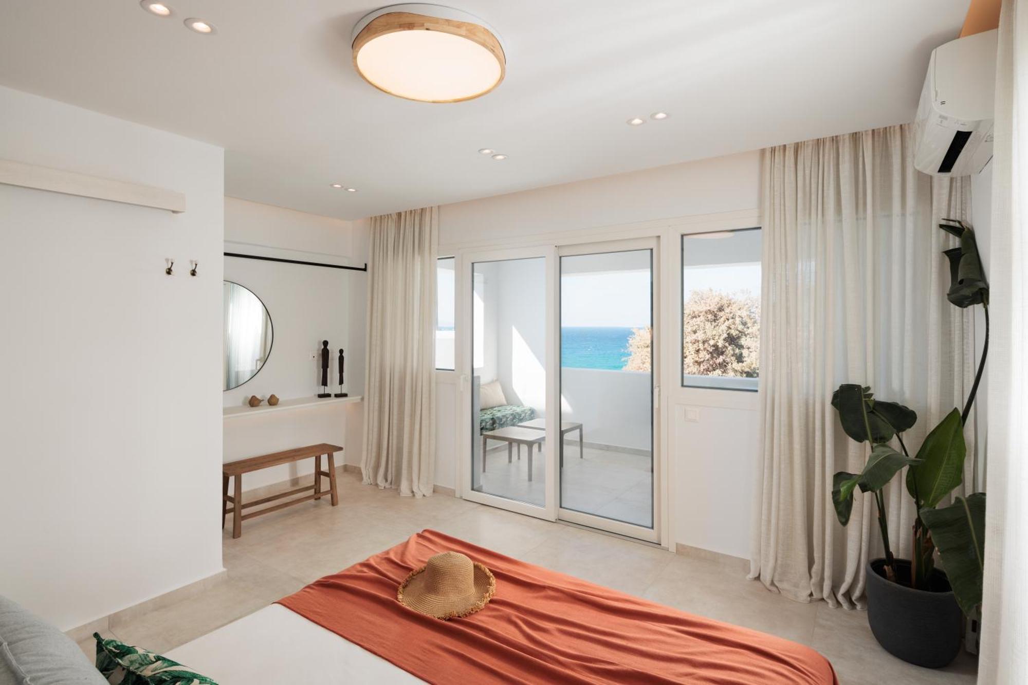 Seanfinity Beachfront Suites Mikri Vigla Habitación foto